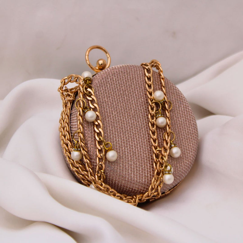 Round Rosegold Clutch